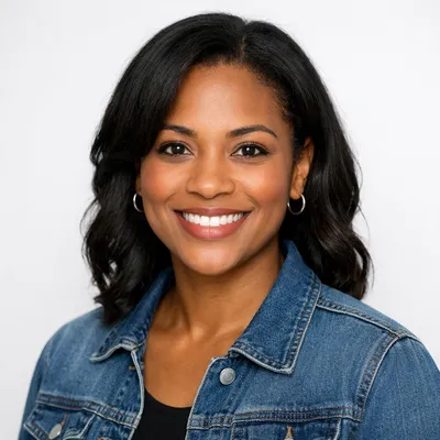 Photorealistic avatar portrait of a professional adult with diverse features, smiling against a soft gray background.